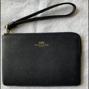 Authentic Coach wristlet. VERY dark navy color.